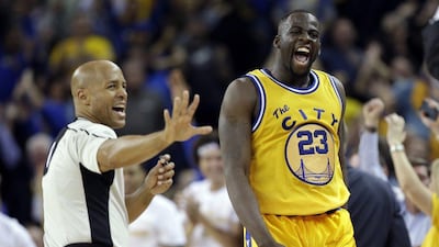 Golden State Warriors' Draymond Green reacts after scoring against the Atlanta Hawks during overtime of an NBA basketball game Tuesday, March 1, 2016, in Oakland, Calif. Golden State won 109-105 in overtime. (AP Photo/Marcio Jose Sanchez)