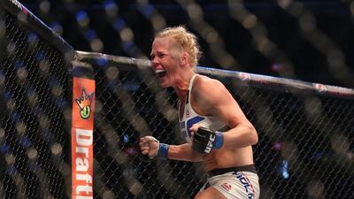Holly Holm of the United States celebrates victory over Ronda Rousey of the United States in their UFC women’s bantamweight championship bout during the UFC 193 event at Etihad Stadium on November 15, 2015 in Melbourne, Australia. (Photo by Quinn Rooney/Getty Images)