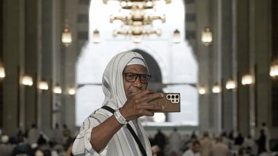 A Muslim pilgrim takes a selfie at the Grand Mosque, during the annual Hajj pilgrimage, in Mecca, Saudi Arabia, Tuesday, June 3, 2025. (AP Photo / Amr Nabil)