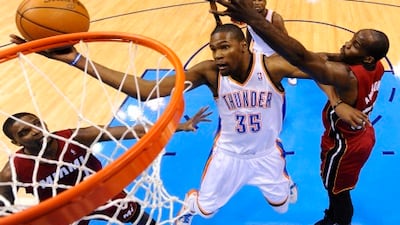 Kevin Durant goes to the basket against the Miami Heat.