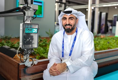 Waleed Al Blooshi with the Auto Farm display during Abu Dhabi Autonomous Week. Victor Besa / The National