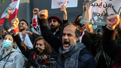Anti-government protesters gather near the parliament building during a protest against power cuts, high cost of living and low purchasing power of the Lebanese pound, in Beirut. Photo: EPA