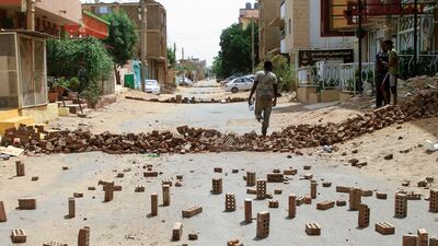 Blocks of brick are used to make barricades. AFP
