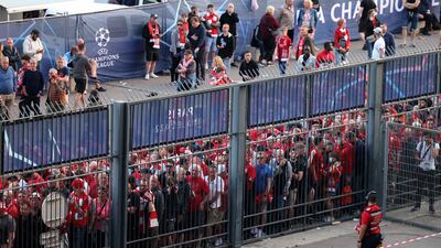 Liverpool fans stand outside the Stade de France, north of Paris, unable to enter in time for the Uefa Champions League final match against Real Madrid. AFP