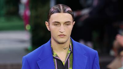 Anwar Hadid walks the runway at the Versace fashion show during Milan Fashion Week spring/summer 2023 on June 18, 2022, in Milan, Italy. Getty Images