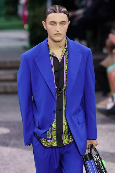 Anwar Hadid, brother of Gigi and Bella, walks for the Versace spring/summer 2023 fashion show during the Milan Fashion Week. Getty Images