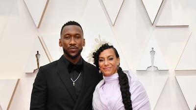 Mahershala Ali, wearing Ermenegildo Zegna, and Amatus Sami-Karim arrive at the Oscars on Sunday, February 9, 2020, at the Dolby Theatre in Los Angeles. AFP