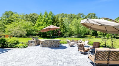 The property comes with expansive gardens. Courtesy Douglas Elliman Realty