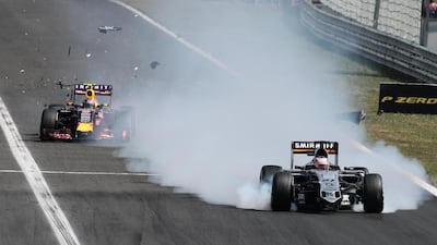 Force India’s Nico Hulkenberg was out on the 42nd lap after his front wing came apart. Ferenc Isza / AFP