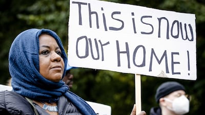 Protesters campaign for permanent residence permits for refugees in the Netherlands. EPA