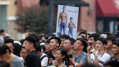 Fans react during the visit of Ronaldo. EPA