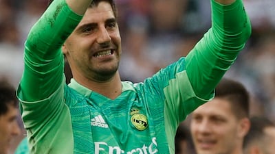 Real Madrid's Thibaut Courtois celebrates after winning La Liga. Reuters