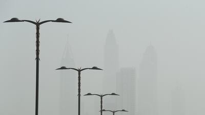 Towers in Dubai Marina as dust reduces visibility to a few hundred metres. Pawan Singh / The National