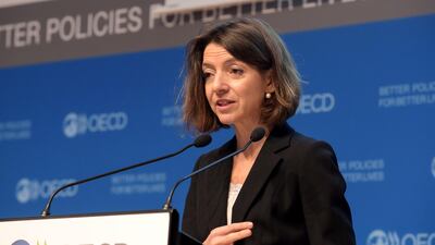 "The imposition of new tariffs and uncertainty about further restrictive trade actions are contributing to a marked slowdown in trade growth, dampening global investment and threatening jobs and living standards," said OECD chief economist Laurence Boone. AFP