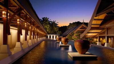 The traditional-style Tanjong Jara Resort has beachfront villas and a dive school that offers snorkelling trips to nearby Tenggol Island.