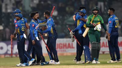 Sri Lanka celebrate after beating Pakistan in the second T20 at the Gaddafi Stadium in Lahore. AFP
