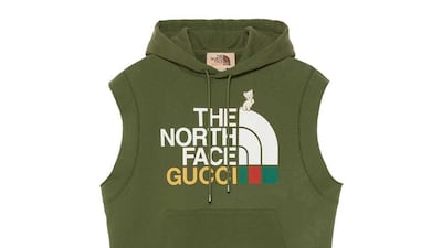 A sleeveless hooded top, with the modified logo that incorporates both companies.