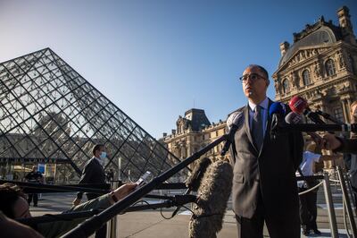 Jean-Luc Martinez, president and director of Louvre, speaks to media about the reopening. EPA