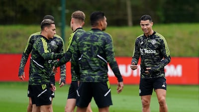 Cristiano Ronaldo takes part in training with Antony and other teammates. PA