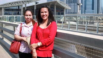 Tourists Jenny Rebizo, 22, and Mary Ann Banla, 27, are happy to public transport to get around Dubai. Victor Besa for The National