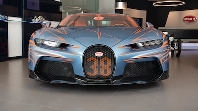 The number 38 emblazoned on the grille of the orange Super Sport.