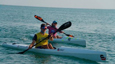 Kayakers race off the coast of Dubai. AP Photo