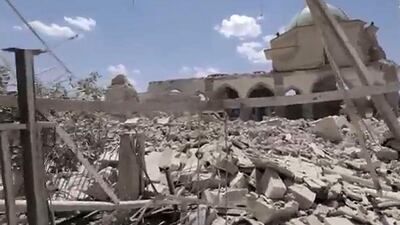 A video grab sows the rubble of Mosul's trademark leaning minaret after jihadists blew it up. AFP