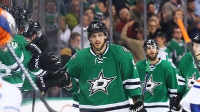 Tyler Seguin, centre, has shed some of his immaturity issues and has proved to be a natural leader on the ice for the Dallas Stars. Ronald Martinez/Getty Images/AFP