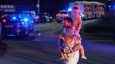 People cross a street after the incident. AFP