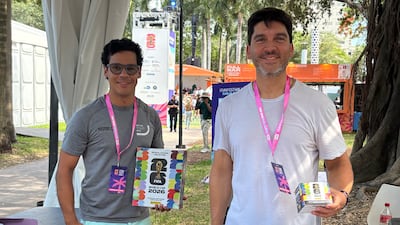 Two men display the 2026 World Cup Panini pack. Kyle Fitzgerald / The National
