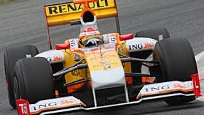 Fernando Alonso tests the Renault F1 car at the Catalunya circuit outside Barcelona.