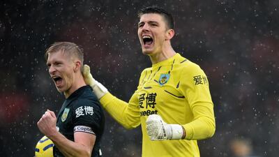 Burnley's Matej Vydra, left, and goalkeeper Nick Pope after thw in over Southampton at St Mary's Stadium. AFP