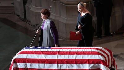 Daughter Meghan McCain walks past the casket at the memorial service of John McCain . Reuters
