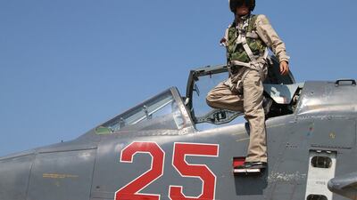 A Russian pilot leaving his Sukhoi Su-25 ground attack aircraft at Hmeimim airbase in the Syrian province of Latakia. AFP