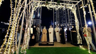 Helal Al Marri, director-general of Dubai Tourism/DFRE, and Hala Badri, director-general of Dubai Culture, explore 'Al Hewee'. Dubai.Chris Whiteoak / The National
