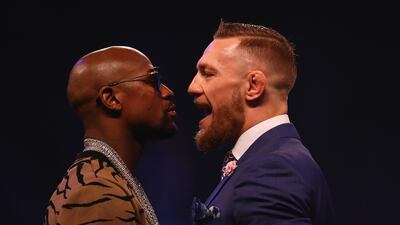 Floyd Mayweather Jr and Conor McGregor come face to face at SSE Arena in London. Matthew Lewis / Getty Images