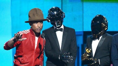 Pharrell Williams, Thomas Bangalter, and Guy-Manuel de Homem-Christo of Daft Punk accept the Best Pop Duo/Group Performance award for 'Get Lucky' during the 56th Grammy Awards. Kevork Djansezian / Getty Images /AFP