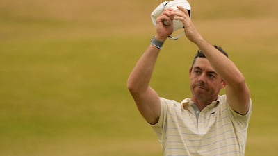 Rory McIlroy applauds the crowd on the 18th green after finishing his final round. AP