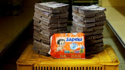 A package of nappies is pictured next to 8,000,000 bolivars, its price at a mini-market in Caracas, Venezuela. It was the going rate at the shop in the low-income neighbourhood of Catia. All pictures by Reuters