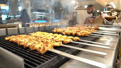 Kebabs being prepared at Turquoise restaurant at Rixos Saadiyat Island.