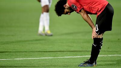 Egypt forward Mohamed Salah takes a breather during the match against DR Congo. AFP