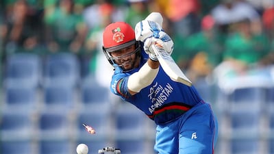 Bangladesh's Abu Hider takes the wicket of Afghanistan's Rahmat Shah.