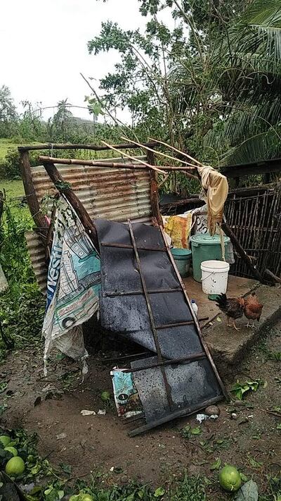 Some of the wreckage of Dubai nanny Edna Palmero's family home in Philippines pulled aside. Courtesy: Ms Palmero