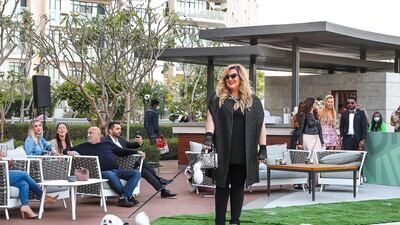 Reem Abousamra and Mochi on the runway. Courtesy Boujie Paws Co