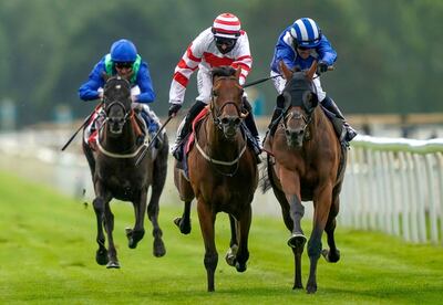 Jim Crowley on board Alfaatik (right) on their way to winning The Sky Bet Handicap at York. PA
