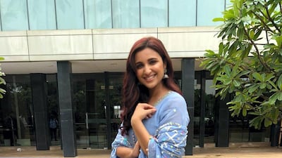 Parineeti Chopra in a bird's-egg blue outfit with pom-pom embellishments