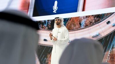 Omar bin Sultan Al Olama, UAE Minister of State for Artificial Intelligence (C), delivers a speech during the UAE Government Annual Meeting at the St Regis Saadiyat. Ryan Carter / Ministry of Presidential Affairs