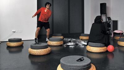 A man dances as he attends The Youth Takeover program at the Jameel Arts Centre. Photo by Shruti Jain