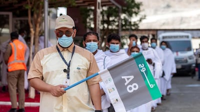 Muslim pilgrims queue as they head to Arafat during the annual Hajj pilgrimage. Reuters