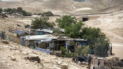 The Jewish settlement of Kfar Adumim overlooks the tiny West Bank Beduin village of Khan al-Ahmar, pictured on May 2,2018. Heidi Levine / The National